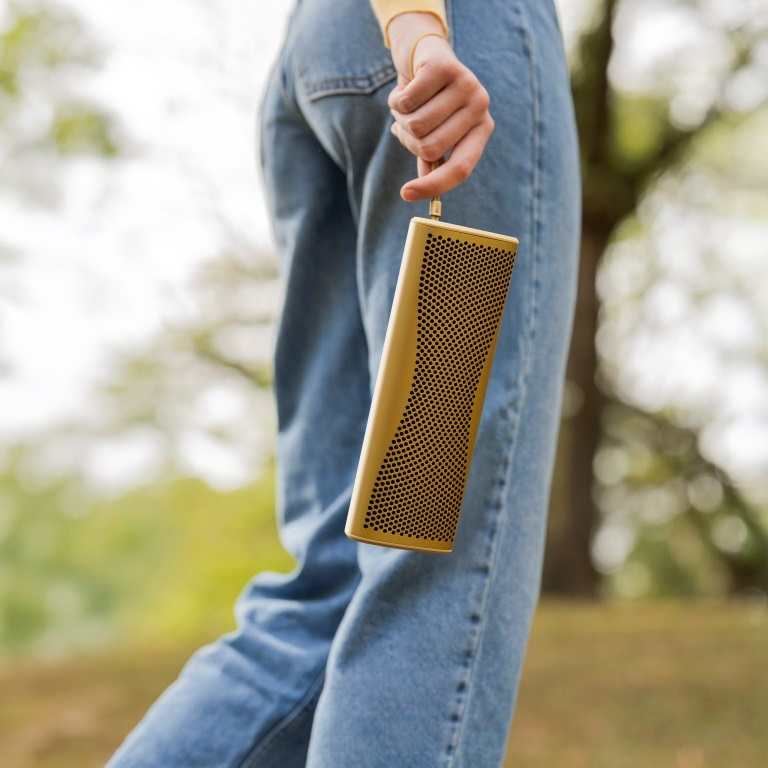 KEF Muo amber haze - lifestyle - Bluetooth speaker